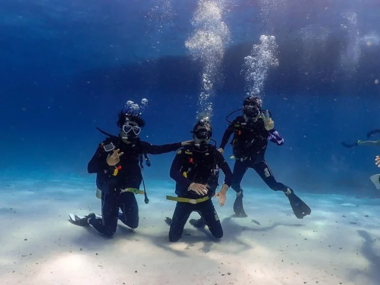 Scuba diving students practising underwater in Phuket