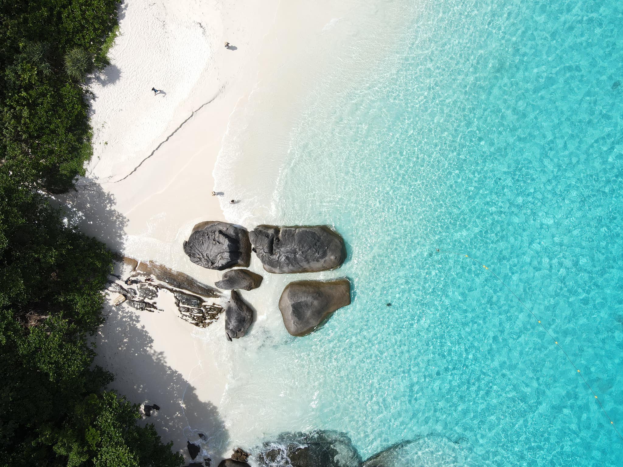Pale sand, granite rocks and turquoise water at the Similan Islands